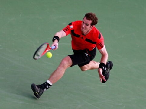 Murray ovecomes hiccup as Hingis comeback ends Murray ovecomes hiccup as Hingis comeback ends
