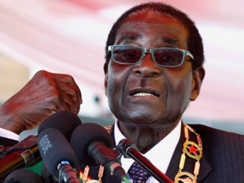 Zimbabwe unsure of political future as pictures emerge of Robert Mugabe smiling and shaking hands with military chief Zimbabwe unsure of political future as pictures emerge of Robert Mugabe smiling and shaking hands with military chief