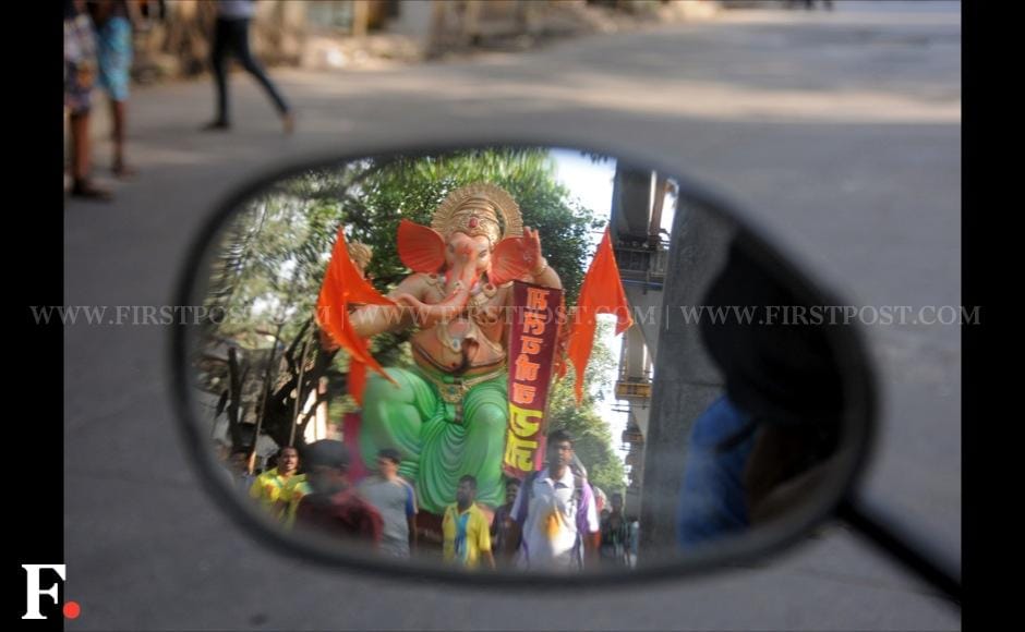 Several feet tall Ganesha idols are being ferried to pandals across Mumbai. Sachin Gokhale/Firstpost Several feet tall Ganesha idols are being ferried to pandals across Mumbai. Sachin Gokhale/Firstpost