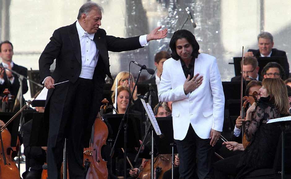Renowned music conductor Zubin Mehta with Music Composer Abhay Rustum Sopori after performing a composition. PTI Renowned music conductor Zubin Mehta with Music Composer Abhay Rustum Sopori after performing a composition. PTI