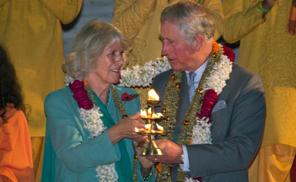 Britain's Prince Charles and Camilla, Duchess of Cornwall take part in the aarti ceremony at the Parmarth Miketan Temple on the banks of the Ganga. REUTERS Britain's Prince Charles and Camilla, Duchess of Cornwall take part in the aarti ceremony at the Parmarth Miketan Temple on the banks of the Ganga. REUTERS