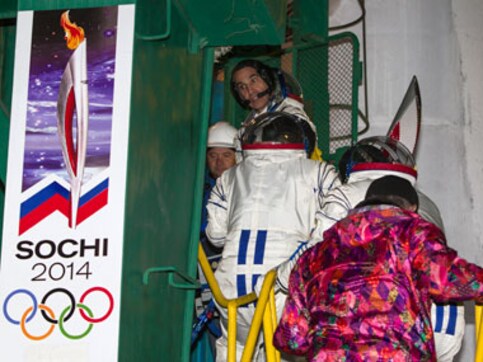 Russia sends Sochi winter Olympic torch into space Russia sends Sochi winter Olympic torch into space