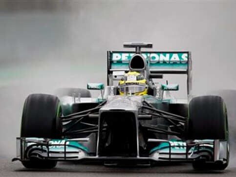 Rosberg fastest in wet Brazil practice Rosberg fastest in wet Brazil practice