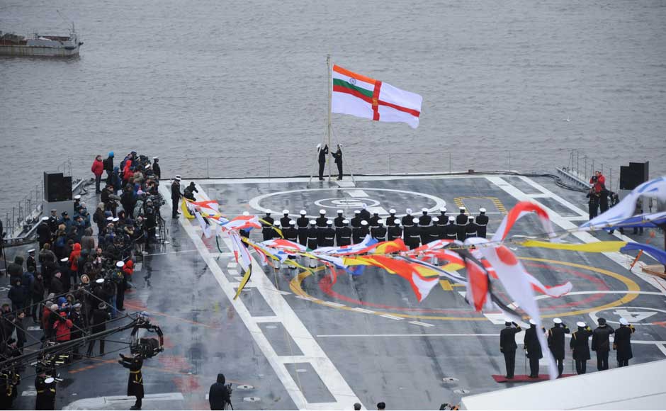 The Indian Navy flag is hoisted on INS Vikramaditya as it is commissioned into Indian Navy, at Sevmash Shipyard in Russia on 16 November 2013. Image courtesy PIB The Indian Navy flag is hoisted on INS Vikramaditya as it is commissioned into Indian Navy, at Sevmash Shipyard in Russia on 16 November 2013. Image courtesy PIB