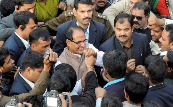 Photos: Smiles all round as Shivraj Singh Chouhan leads BJP to power in MP Photos: Smiles all round as Shivraj Singh Chouhan leads BJP to power in MP