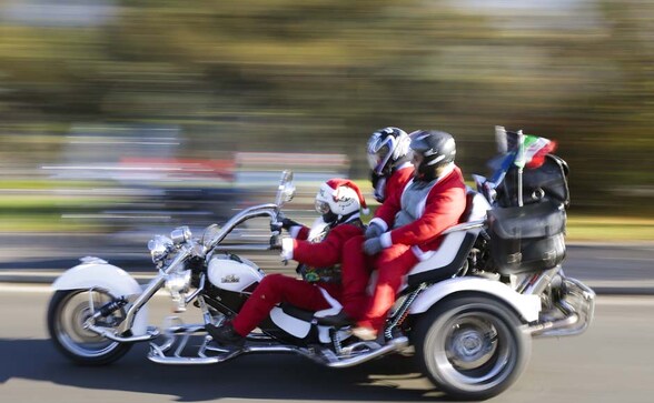 Photos: Bikers, swimmers and more, check out the world's weirdest Santas