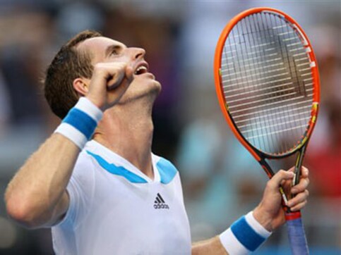 Murray shakes off rust to advance at Australian Open Murray shakes off rust to advance at Australian Open