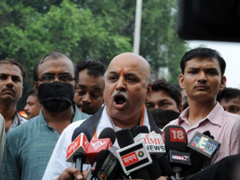 VHP leader Pravin Togadia remains non-committal on support to Modi