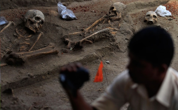 Photos: Mass grave discovered in former war zone in Sri Lanka Photos: Mass grave discovered in former war zone in Sri Lanka