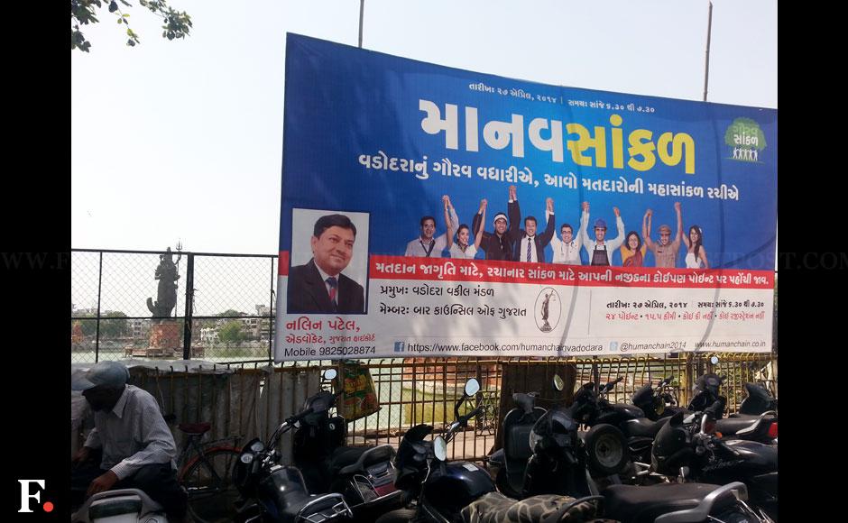 Another invitation for sunday evening's human chain of voters, along the lake with a giant shiva statue in the middle. Kavitha Iyer/ Firstpost Another invitation for sunday evening's human chain of voters, along the lake with a giant shiva statue in the middle. Kavitha Iyer/ Firstpost