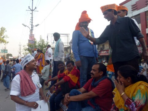 Butting heads in Varanasi: Modi roadshow meets AAP's jansabha Butting heads in Varanasi: Modi roadshow meets AAP's jansabha