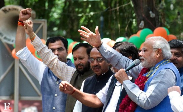 Photos: BJP lines up garlands and tea to welcome Modi in Delhi Photos: BJP lines up garlands and tea to welcome Modi in Delhi