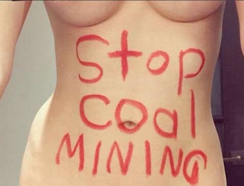 Model goes nude to protest against Adani's Australia coal mine project Model goes nude to protest against Adani's Australia coal mine project