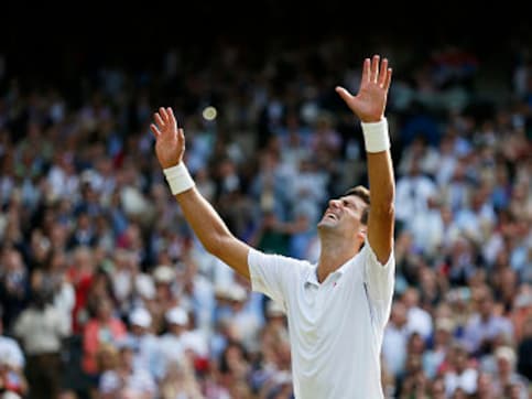 Djokovic beats Federer in five set thriller to win Wimbledon 2014 Djokovic beats Federer in five set thriller to win Wimbledon 2014