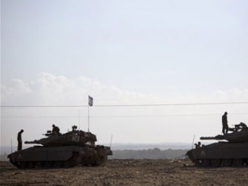 Israel hits 30 Gaza homes, kills senior Hamas leader Israel hits 30 Gaza homes, kills senior Hamas leader