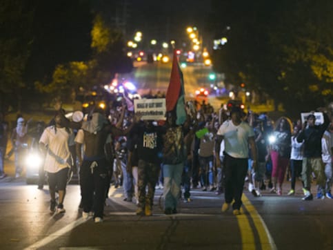 Cops fire tear gas as Missouri sees more unrest after killing of teen Cops fire tear gas as Missouri sees more unrest after killing of teen
