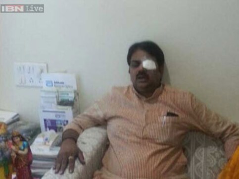 Maharashtra minister suffers eye injury after protesters threw ink at him Maharashtra minister suffers eye injury after protesters threw ink at him