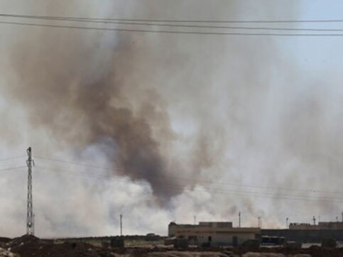 Iraq: 23 dead in suicide bombings; federal police HQ attacked Iraq: 23 dead in suicide bombings; federal police HQ attacked