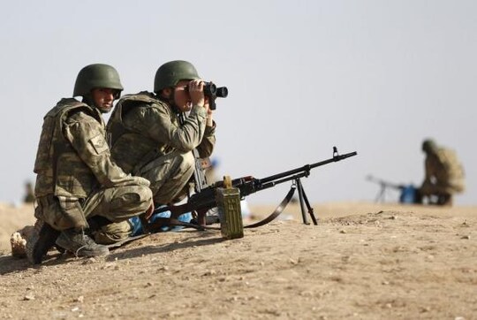 Syrian border town still under siege by Islamic State despite allied air strikes Syrian border town still under siege by Islamic State despite allied air strikes