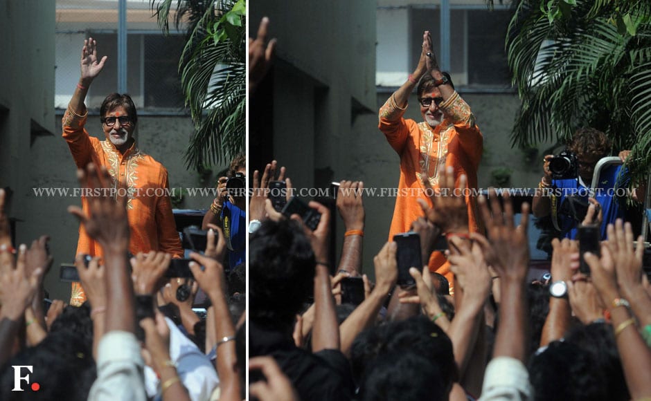 Big B looked happy, sporting a bright orange kurta as he waved to his fans on his birthday. Sachin Gokhale/Firstpost Big B looked happy, sporting a bright orange kurta as he waved to his fans on his birthday. Sachin Gokhale/Firstpost