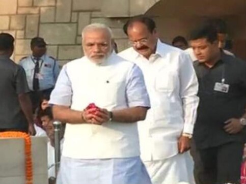 Ahead of Swachh Bharat launch, PM Modi pays tributes to Gandhiji Ahead of Swachh Bharat launch, PM Modi pays tributes to Gandhiji