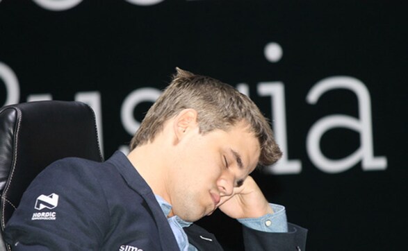 Photos: Sleepy? No problem, world champion Carlsen still draws with Anand Photos: Sleepy? No problem, world champion Carlsen still draws with Anand