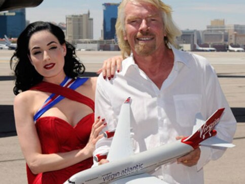 Image correction? Richard Branson vows to be first space passenger despite crash Image correction? Richard Branson vows to be first space passenger despite crash