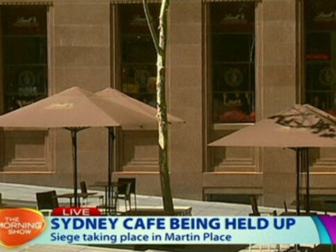 Sydney crisis: Radio host speaks to one hostage held in Lindt cafe Sydney crisis: Radio host speaks to one hostage held in Lindt cafe