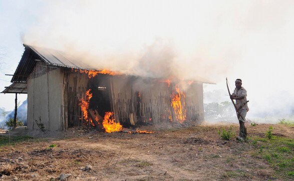 Photos: In village worst hit by Assam violence, houses burn, hundreds flee Photos: In village worst hit by Assam violence, houses burn, hundreds flee