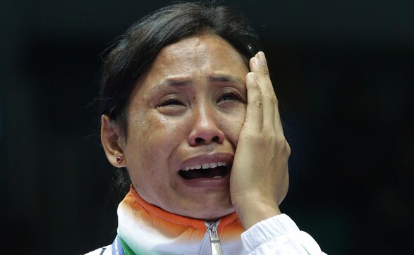 Sarita Devi to Roger Federer: The most iconic images defining the world of sport in 2014 Sarita Devi to Roger Federer: The most iconic images defining the world of sport in 2014
