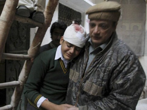 Children, staff return to Peshawar school for first time after horrific Taliban attack Children, staff return to Peshawar school for first time after horrific Taliban attack