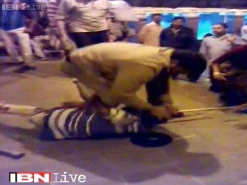 Caught on camera: RPF official thrashes disabled man at Howrah station Caught on camera: RPF official thrashes disabled man at Howrah station