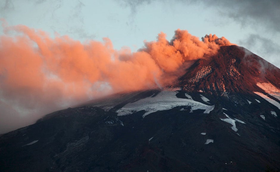 The 9,000 foot (2,847-metre) Villarrica volcano in Chile's central valley, 400 miles (670 kilometres) south of Santiago, sits above the small city of Pucon, which has a population of about 22,000 people. The series of the volcanoes' latest eruptions started on 7 February, causing minor ash plumes and sporadic explosions, which made the authorities raise a yellow level alert. (Reuters image) The 9,000 foot (2,847-metre) Villarrica volcano in Chile's central valley, 400 miles (670 kilometres) south of Santiago, sits above the small city of Pucon, which has a population of about 22,000 people. The series of the volcanoes' latest eruptions started on 7 February, causing minor ash plumes and sporadic explosions, which made the authorities raise a yellow level alert. (Reuters image)
