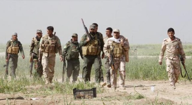 Iraqi troops pause, await back-up in battle for Tikrit against militants Iraqi troops pause, await back-up in battle for Tikrit against militants