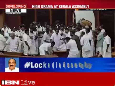 Chaos in Kerala assembly: MPs hurl chairs, break computers to stop 'corrupt' Mani from presenting budget Chaos in Kerala assembly: MPs hurl chairs, break computers to stop 'corrupt' Mani from presenting budget