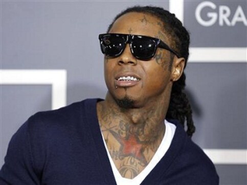 Gunmen open fire on two buses carrying rap star Lil Wayne and his entourage Gunmen open fire on two buses carrying rap star Lil Wayne and his entourage