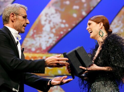 Julianne Moore collects last year's award at Cannes Julianne Moore collects last year's award at Cannes
