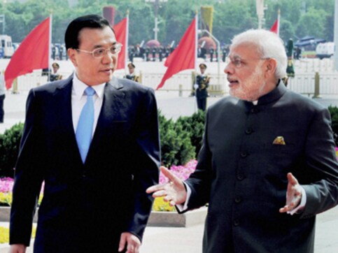 China pleased with Modi's E-visa grant, but is the 'Dragon' willing to reciprocate? China pleased with Modi's E-visa grant, but is the 'Dragon' willing to reciprocate?