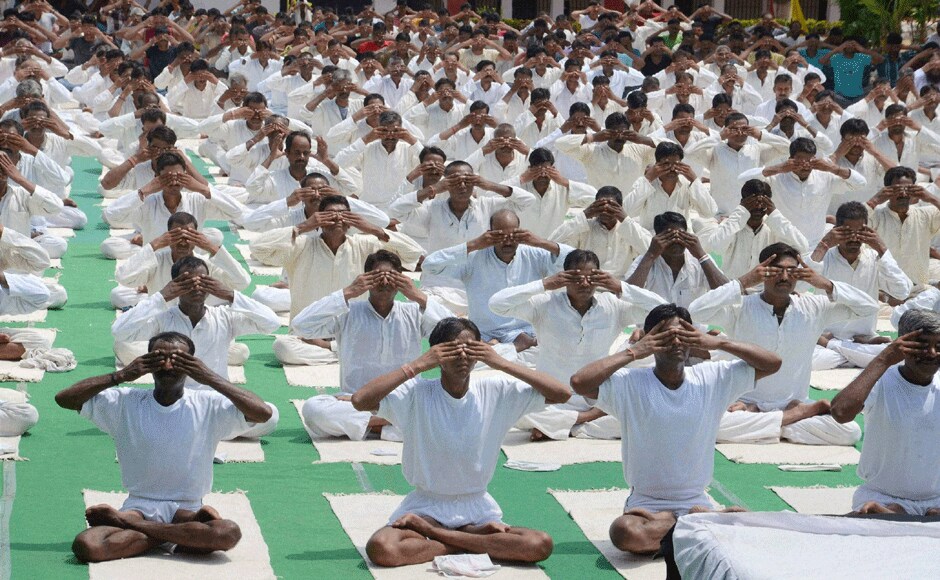 People from all walks of life performed asanas. In this photo we see inmates of a Bhopal prison practicing pranayama. PTI People from all walks of life performed asanas. In this photo we see inmates of a Bhopal prison practicing pranayama. PTI