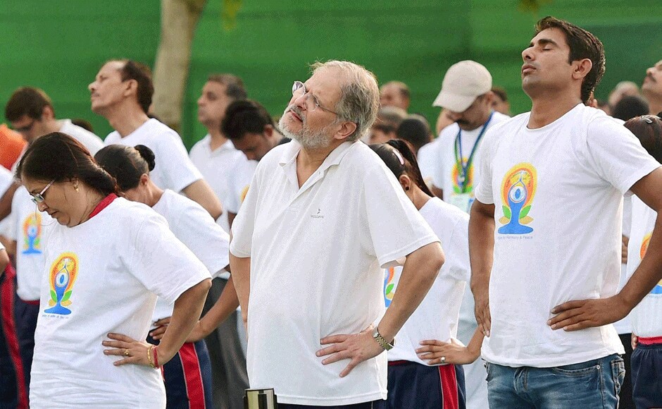 They say yoga unites. It seems truly so as we see Najeeb Jung in the same event as Kejriwal. PTI They say yoga unites. It seems truly so as we see Najeeb Jung in the same event as Kejriwal. PTI