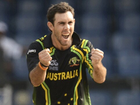 Ice-cool scoop: Maxwell takes one-handed catch holding ice cream Ice-cool scoop: Maxwell takes one-handed catch holding ice cream