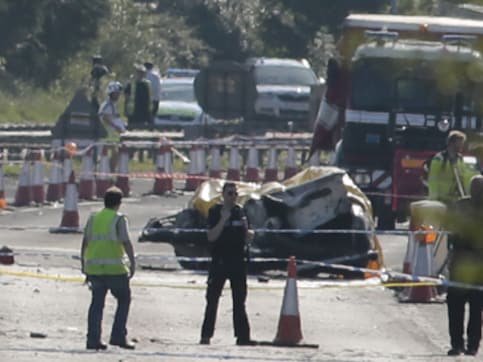 Seven dead after military jet in UK airshow crashes into road Seven dead after military jet in UK airshow crashes into road