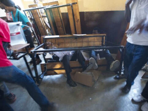 Unrest, violence breaks out as Haitians vote in long-delayed elections Unrest, violence breaks out as Haitians vote in long-delayed elections