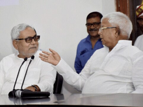 Nitish's arrow hits the bullseye in Bihar, thanks to Lalu's lantern Nitish's arrow hits the bullseye in Bihar, thanks to Lalu's lantern