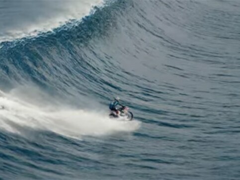 Must watch: Australian stuntman surfs massive wave on a motorbike Must watch: Australian stuntman surfs massive wave on a motorbike