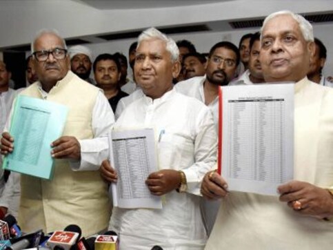 Grand alliance finalises seat distribution: JD(U), RJD to contest on 101 seats while Congress will fight on 41 seats in Bihar Grand alliance finalises seat distribution: JD(U), RJD to contest on 101 seats while Congress will fight on 41 seats in Bihar