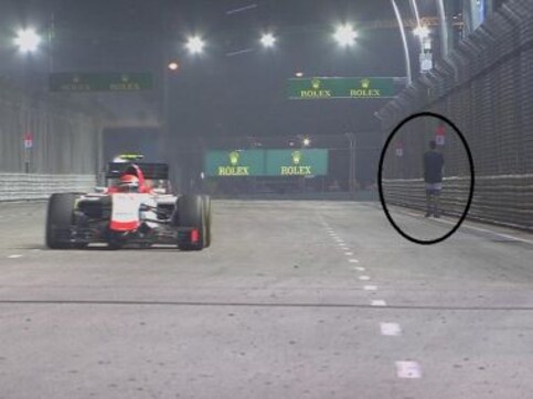 Singapore Grand Prix track-invader charged for 'rash act' Singapore Grand Prix track-invader charged for 'rash act'