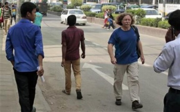 Two foreigners gunned down in Bangladesh, local businesses suffer Two foreigners gunned down in Bangladesh, local businesses suffer