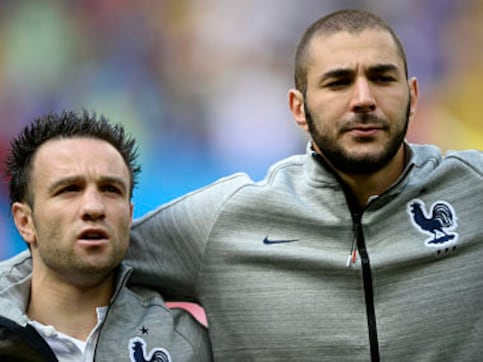 Real Madrid striker Benzema charged in sex tape extortion case; dropped by France Real Madrid striker Benzema charged in sex tape extortion case; dropped by France