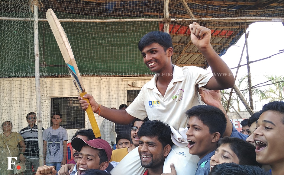 Pranav Dhanawade perched upon his friends after hitting record 1,009 runs not-out. Jigar Mehta/Firstpost Pranav Dhanawade perched upon his friends after hitting record 1,009 runs not-out. Jigar Mehta/Firstpost